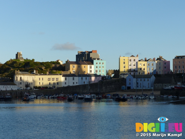 FZ020924 Reflection in beach of colourful houses in Tenby